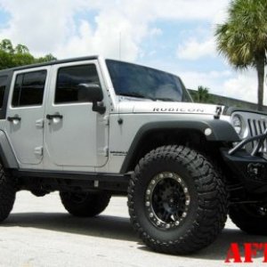 Dales Super Store Recon clear lens jeep:

http://dalessuperstore.com/i-7328428-recon-264135cl-led-front-fender-lens-clear-for-jeep-wrangler-jk-07-15.h